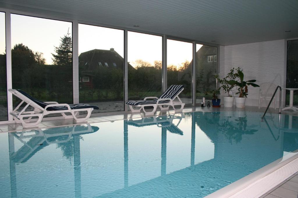 Ferienwohnungen Im Hotel Garni Zur Post Utersum ห้อง รูปภาพ